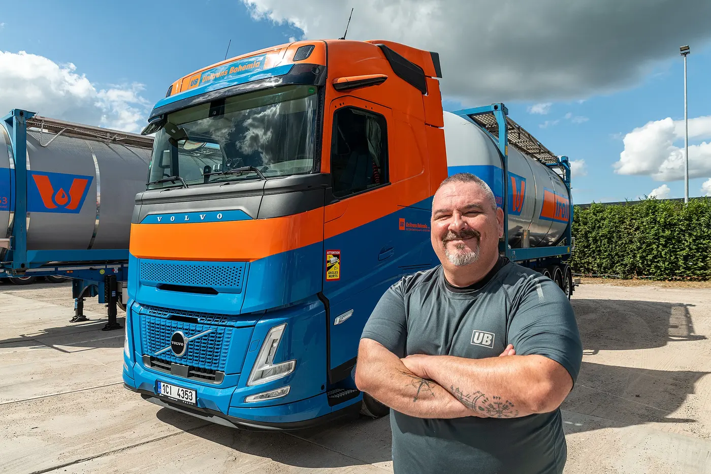 Unitrans Bohemia driver standing by a modern tanker truck
